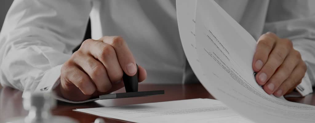 Solicitor stamping Will