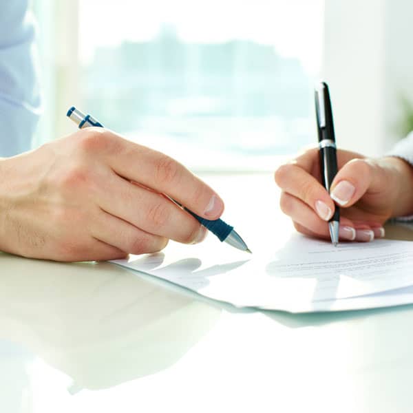 Solicitor going through document with client